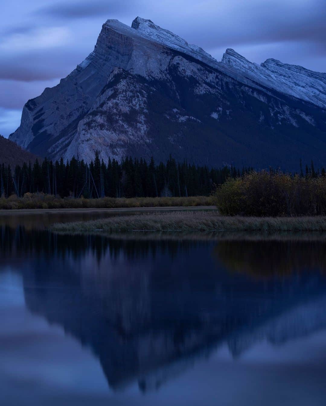 CANON USAさんのインスタグラム写真 - (CANON USAInstagram)「Photo by @paulzizkaphoto "Blue hour at Mount Rundle. Autumn oranges fade into cooler nighttime hues at Vermilion Lakes, Banff National Park, Canada. I was blown away by the sharpness of the RF70-200mm F4 L IS USM once again and won't hesitate printing this one big."  📸: #Canon EOS R5 Lens: RF70-200mm F4 L IS USM」12月12日 23時51分 - canonusa