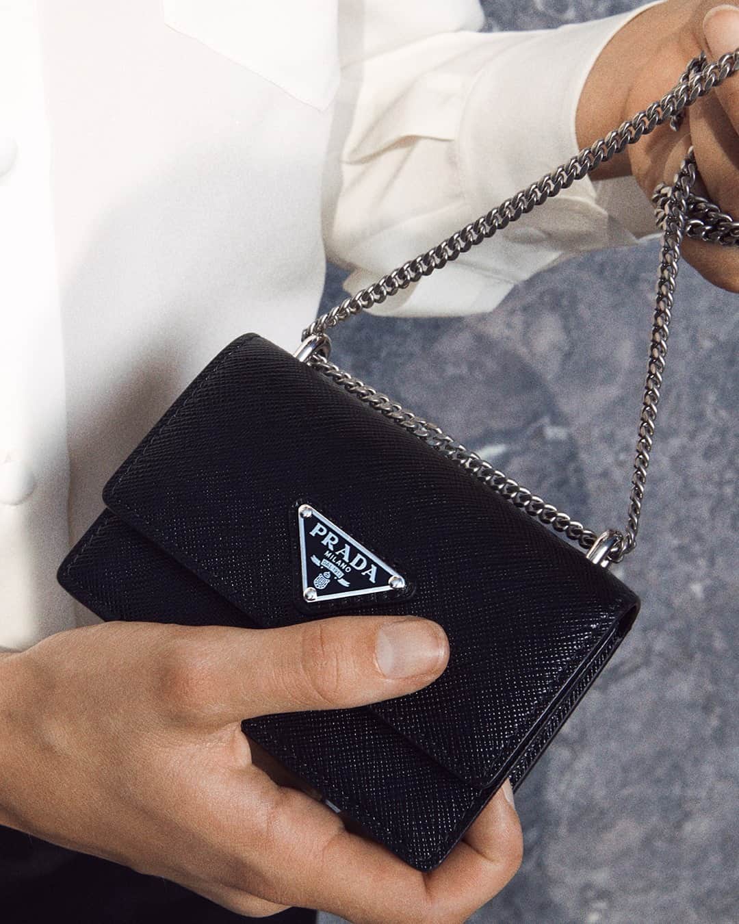 のインスタグラム：「A keepsake for safe keeping. As seen in “A Stranger Calls”, the #PradaHoliday20 campaign.  Discover more via link in bio. #PradaGifts #Prada」