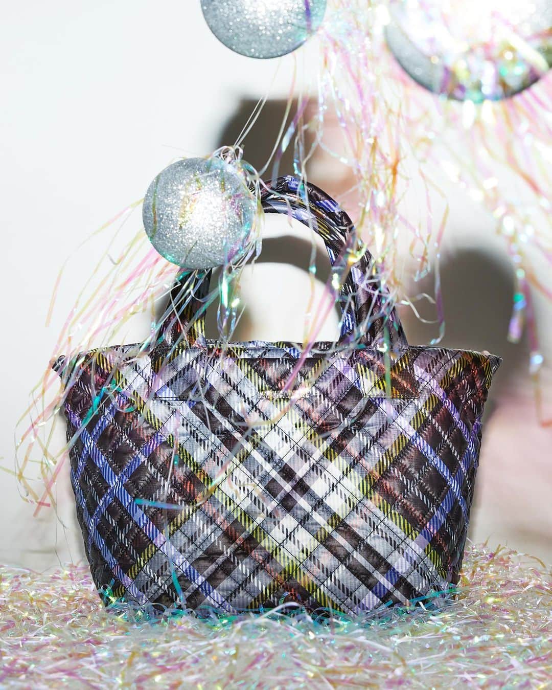 MZウォレスのインスタグラム：「Day 11! We're mad for this new plaid print — wear it now for an extra dose of festive feelings, and all year round for visual appeal. We only made a few of this limited edition in the Small Metro Tote Deluxe and Micro Sutton (swipe to see both), so tap to shop now. Head to our stories to get a closer look.  One more surprise left! What do you think it will be? Let us know in the comments below.」