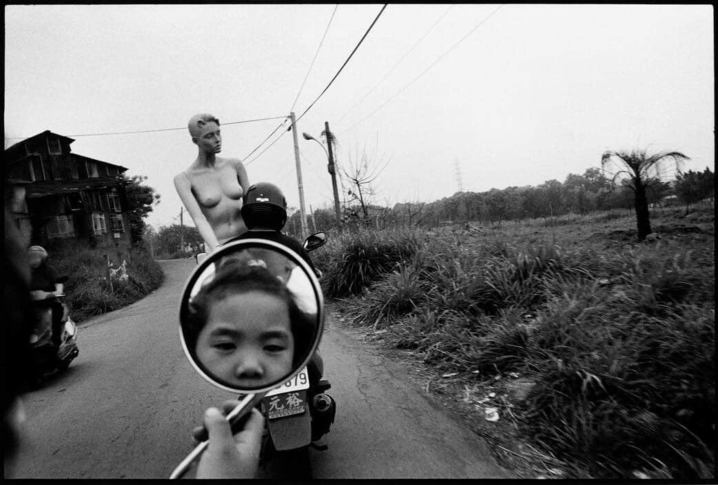 thephotosocietyさんのインスタグラム写真 - (thephotosocietyInstagram)「Photo by @chien_chi_chang A mannequin on a scooter. Taichung, Taiwan. 2000. Imagination is the beginning of creation. While driving on a small motorbike with my brother-in-law and niece down a tired old lane, this mannequin suddenly appeared and changed everything. We followed it and thought of where it had been and what clothes — so different from ours — it had worn. We wondered what the angles of its face and body idealized. A short time later, it turned off. We went straight and continued to imagine. We still do. #MagnumPhotos」12月14日 3時05分 - thephotosociety