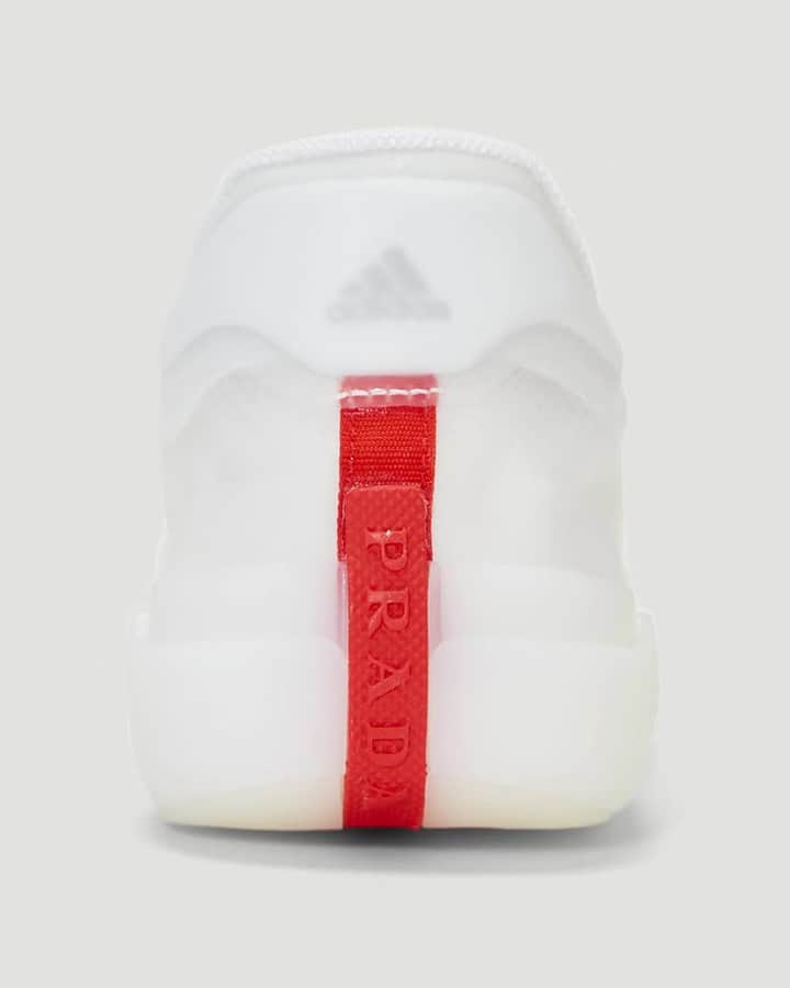 エルエヌシーシーのインスタグラム：「Introducing the adidas for Prada A+P LUNA ROSSA 21.  Fuelled by a combined dedication to innovation and sustainability, the A+P LUNA ROSSA 21 serves as a collaborative step towards both adidas and Prada's commitments to the environment – featuring expertly engineered PRIMEGREEN, a series of high performance recycled materials.  Constructed with sport performance at its core, the brand-new silhouette is crafted for competitive sailing, its athletes, and inspired by the design of both the new AC75 LUNA ROSSA boat and each brands’ iconic archive sneakers.  Available now at @thelncc #adidasforprada @prada @adidasoriginals」