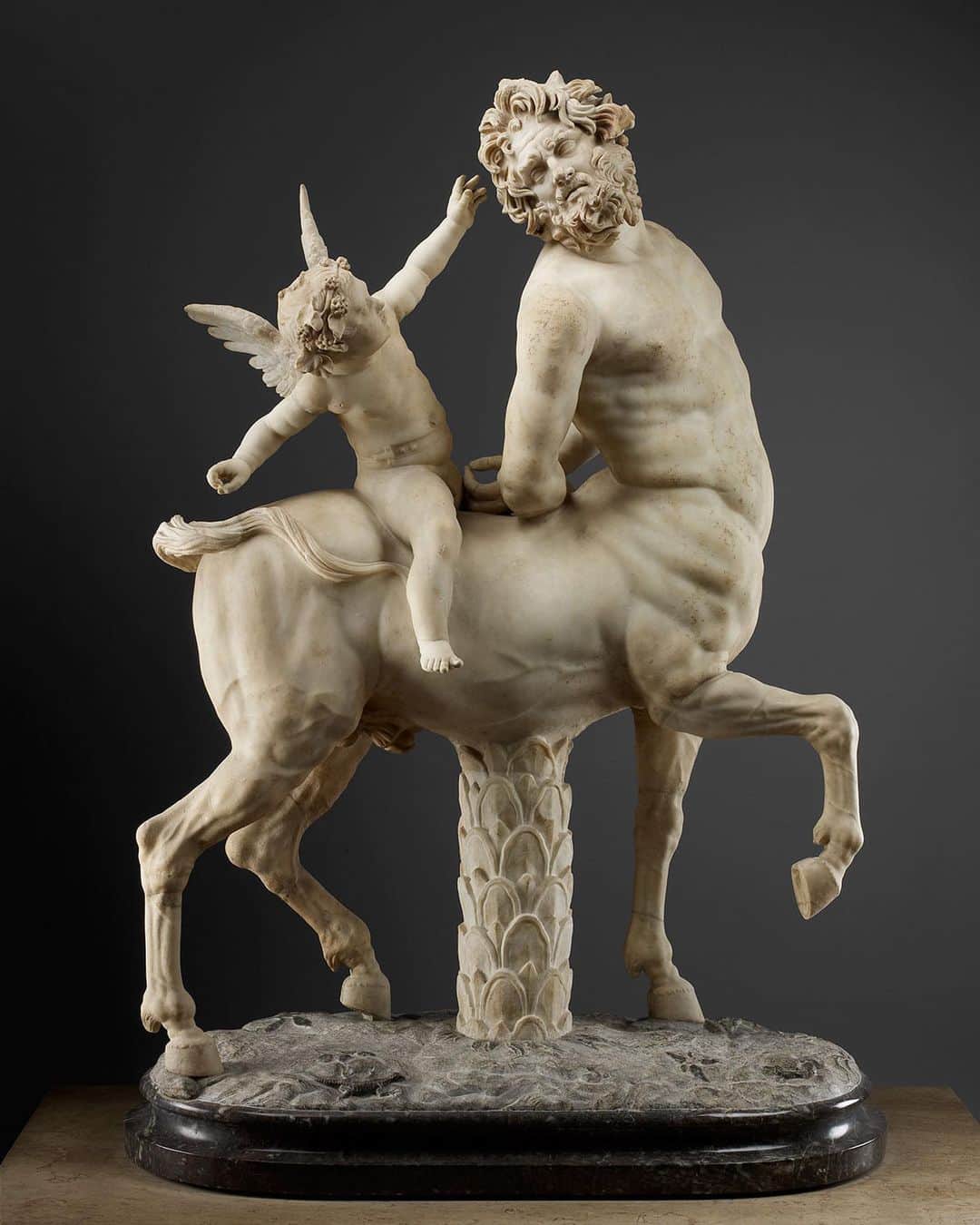 ルーブル美術館さんのインスタグラム写真 - (ルーブル美術館Instagram)「. 🇫🇷 Nous vous souhaitons une #BonneSemaine avec le Centaure chevauché par l’Amour ! ☺️ - 💪 Cette statue représente un centaure âgé tourmenté par Eros ou Cupidon, dieu de l’amour. Être mi-homme mi-cheval, le Centaure tourne le regard vers l’arrière dans une torsion du buste, arborant une musculature saillante. Le mouvement de sa tête montre son effort pour voir le personnage installé sur sa croupe. - 👼 L’air furieux du Centaure contraste avec l'attitude de Cupidon, putti aux ailes déployés, qui s'amuse à lui tirer les cheveux et à lui arracher les poils, l’air enjoué. Taquin, le dieu de l'Amour a attaché les mains du centaure afin qu'il ne puisse se débattre. - 🔎 Cette statue en marbre provient de l’ancienne Collection Borghèse. Elle a été sculptée à Rome au IIe siècle après J.-C., d’après un original grec créé au IIe siècle avant J.-C. - - - - 🌎 We wish you a #GoodWeek with the Centaur straddled by Cupid! ☺️ - 💪 This statue represents an old centaur tormented by Eros or Cupid, god of love. Half-man half-horse, the Centaur turns his gaze backwards in a twist of the bust, displaying a powerful musculature. The movement of his head shows his effort to see the figure sitting on his rump. - 👼 The centaur looks furious, contrasting with the attitude of Cupid, putti with spread wings, who has fun pulling his hair out. The mischievous god of Love has tied the centaur's hands so that he can't struggle. - 🔎 This marble statue comes from the Borghese Collection. It was carved in Roma in the 2nd century AD, after a Greek original created in the 2nd century BC. - 📷 © Musée du Louvre / Maëlys Feunteun / Thierry Ollivier . . . #Louvre #MuséeDuLouvre #LouvreChezVous #MuseumFromHome #CultureChezNous」12月15日 1時57分 - museelouvre