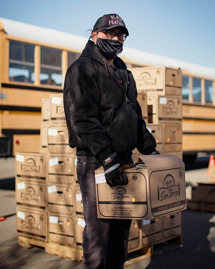 TIME Magazineさんのインスタグラム写真 - (TIME MagazineInstagram)「Early in the pandemic, when the disease had not yet spread throughout the U.S., @petesandsman—musician, activist and member of the Navajo Nation—was working in the communications department of the @utahnavajohealthsystem when he was talking with the clinic’s board members. “There was just something that kind of spoke inside all of us saying, ‘This is going to come here.’” By May, the Navajo Nation had surpassed New York for the highest case rate in the country. Sands and the clinic established pop-up testing sites and—in collaboration with the Mormon church, the Utah Trucking Association, the produce company SunTerra and others—provided food and firewood through deliveries to rural residents and curbside pickups, where cars lined up for miles as residents waited their turns. Sands and frontline health workers around the world are TIME's 2020 Guardians of the Year. Read more and see the rest of #TIMEPOY at the link in bio. Photograph by @adriamalcolm for TIME」12月15日 3時58分 - time