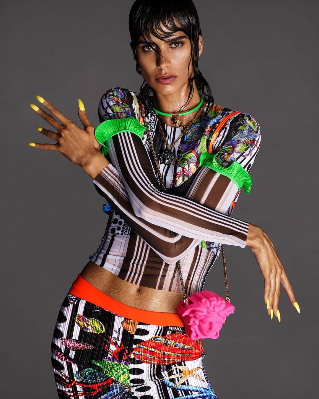 ジャンニヴェルサーチのインスタグラム：「Mica Argañaraz 🔱 Preview the fierce faces of the #VersaceSS21 campaign and our new #VersaceLaMedusa handbag. Learn more through the link in bio.  Chief Creative Officer: Donatella Versace @donatella_versace  Creative Director: Ferdinando Verderi @ferdinandoverderi  Photographers: Mert & Marcus @mertalas @macpiggott  Stylist: Jacob K @kjeldgaard1  Makeup Artist: Lucia Pieroni @lucia_pieroni  Hair Stylist: Paul Hanlon @paulhanlonhair  Casting Director: Piergiorgio Del Moro @pg_dmcasting」