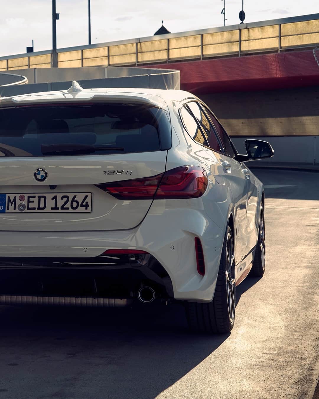 BMWのインスタグラム：「128 reasons to smile. The new BMW 128ti. #THE1 #BMW #1Series #sports @thejasonpaul  __ BMW 128ti: Fuel consumption weighted combined in l/100km: 6.4–6.1 (NEDC); 7.5–6.9 (WLTP), CO2 emissions weighted combined in g/km: 148–139 (NEDC); 170–157 (WLTP). Further information: www.bmw.com/disclaimer.   265 hp, 195 kW, 400 Nm, Acceleration (0-100 km/h): 6.1 s, Top speed (limited): 250 km/h.」