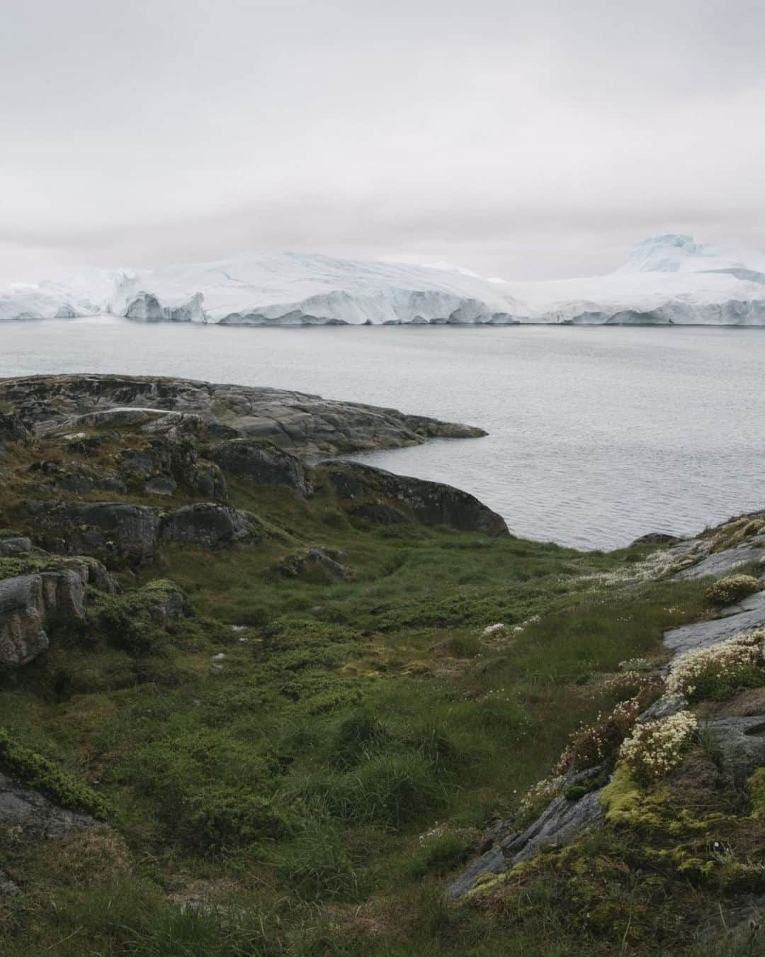 大英博物館さんのインスタグラム写真 - (大英博物館Instagram)「In our latest blog, #ArcticExhibition curator Jago Cooper reflects on the profound impact of climate change on Arctic Peoples and their way of life, and what we can learn at this crucial time for the future of our planet.   Learn more via the link in our bio.   📸 Tundra in Ilulisaat, Greenland. Kiliii Yuyan (b. 1979), 'Ilulisaat’s Living Ice Fjord'. Inkjet print, 2018. © Kiliii Yuyan.  #BritishMuseum #Arctic #Exhibition」1月9日 20時30分 - britishmuseum