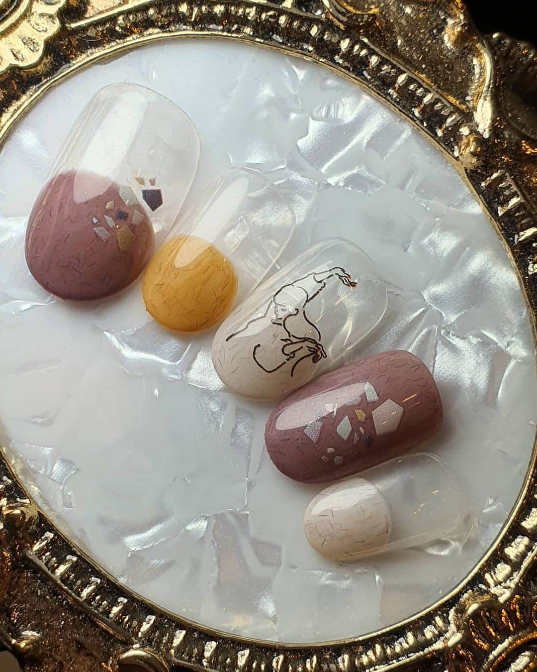 Yingのインスタグラム：「I used PREMDOLL MUSE G653, G654 and G659 for the base. Also used @tsumekira stickers in NN-MEG-103 (Meg Produce 2 for... girl's!) and NN-TER-101 (Terrazo Tile Earth Colour)  Items can be purchased at @nailwonderlandsg 🤗 . . . 🛒 www.nailwonderland.com⁣⁣ 📍20A Penhas Road, Singapore 208184⁣⁣ (5 minutes walk from Lavender MRT)⁣⁣ .  I am currently only able to take bookings from my existing pool of customers. If I have slots available for new customers, I will post them on my IG stories. Thank you to everyone who likes my work 🙏 if you need your nails done, please consider booking other artists at @thenailartelier instead ❤  #ネイルデザイン  #ネイルアート #ネイル #ジェルネイル #nailart #네일아트 #pregel #プリジェル #nails #gelnails #sgnails #cnynails」