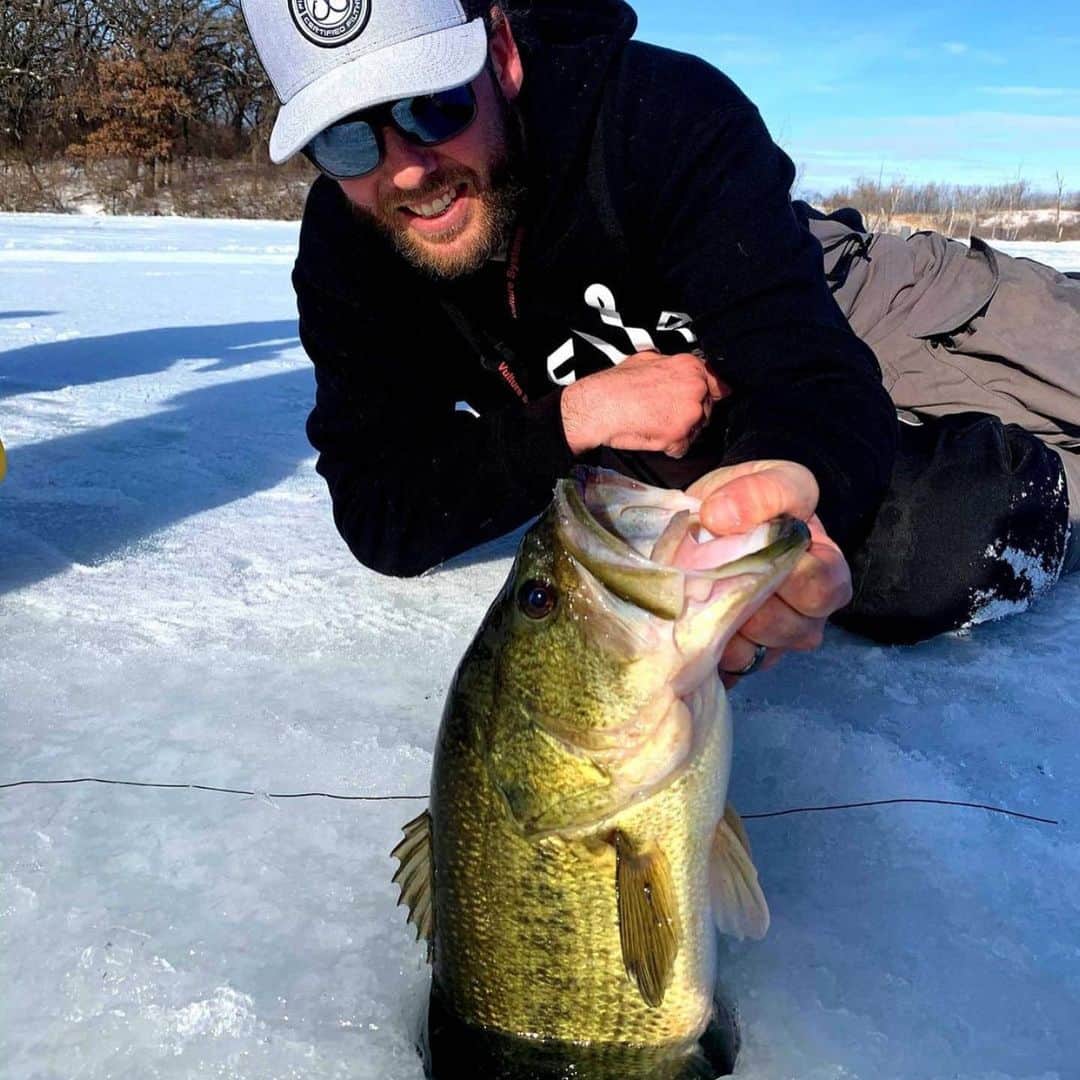Filthy Anglers™さんのインスタグラム写真 - (Filthy Anglers™Instagram)「Im guessing our buddy Tyler Bell @tyler_the_fish_whisperer wished he drilled a bigger hole when he saw what was coming up, it just squeezed through! Checkout the second photo. He landed this largemouth up in Wisconsin today. Congrats on the catch Tyler you are Certified Filthy, thanks for the support! www.filthyanglers.com #fishing #teamfilthy #bassfishing #icefishing #outdoors #nature #wisconsin #cobrakai #filthyanglers #angler #monsterbass #bigfish」1月10日 12時25分 - filthyanglers