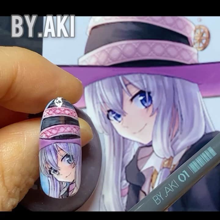 のインスタグラム：「魔女の旅々🌙 『灰の魔女』イレイナ💜  ツボな可愛さ✨そして… ラノベの1冊が膨大🌀 アニメ待ってましたー  #mazyonotabitabi  #魔女の旅々  #reina  #イレイナ   @by.aki#anime#manga#NAIL#ジェルネイル#ネイル#福岡#福岡市#全てジェルネイル#手描きネイル#all.gel#痛ネイル#ネイリスト#aki#認定講師#キャラネイル#네일#gel甲#美甲#爪甲」