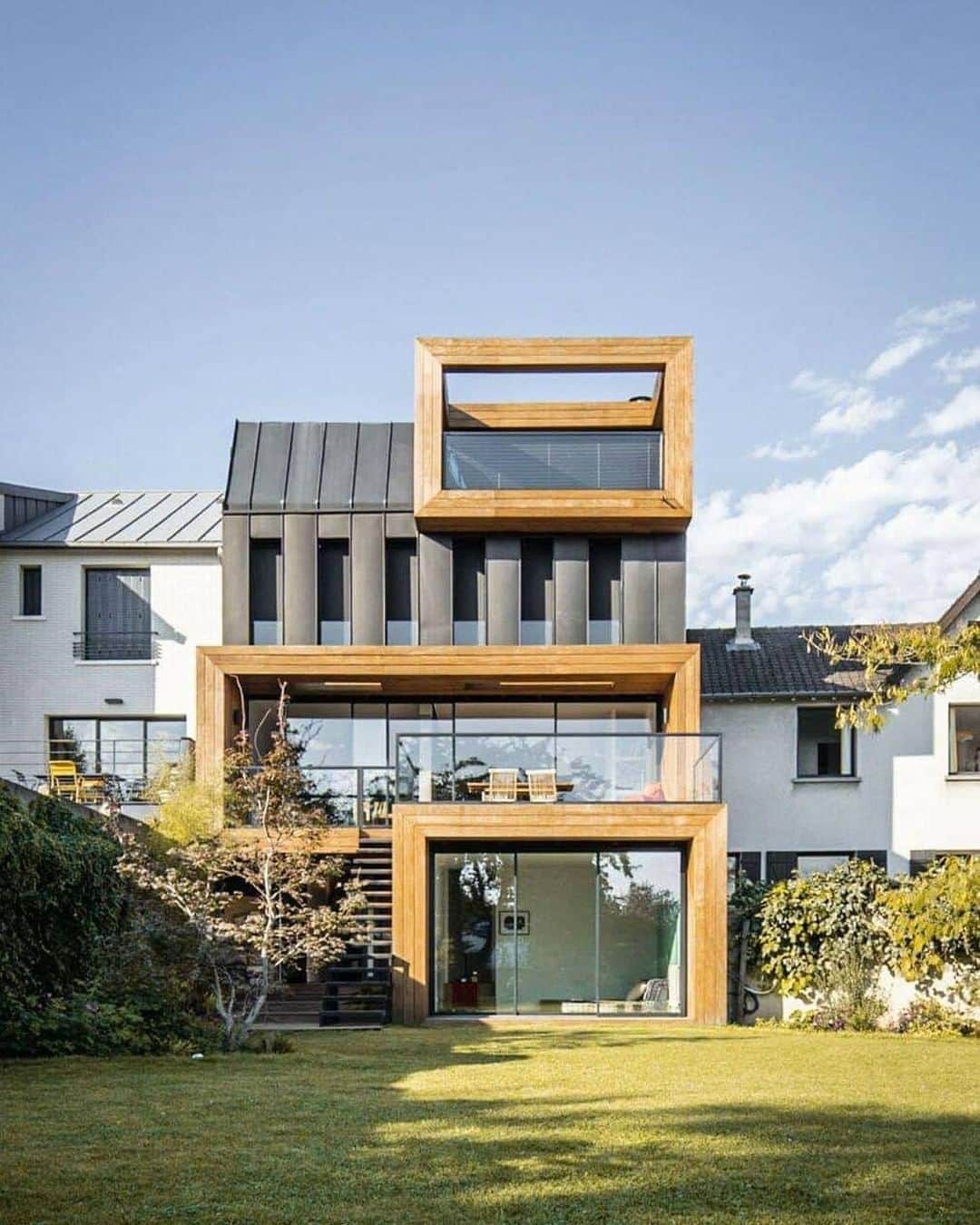 Architecture - Housesさんのインスタグラム写真 - (Architecture - HousesInstagram)「⁣ 𝐑𝐞𝐦𝐨𝐝𝐞𝐥𝐢𝐧𝐠 𝐩𝐫𝐨𝐣𝐞𝐜𝐭 𝐢𝐧 #𝐅𝐫𝐚𝐧𝐜𝐞⁣  @skp_architecture had a challenge: they had to remodel a house from 1950s / 1960s spatially and thermally and give it a more contemporary architecture. The part of the wooden roof was removed in order to change its size and create an elevation. On the street side, a one-storey extension was placed in the extension of the existing garage in order to enlarge the latter. ⁣ What do you think about it? Tag an #architecture lover 💙⁣ _____⁣⁣⁣⁣⁣⁣⁣⁣⁣⁣⁣⁣⁣⁣⁣⁣⁣⁣⁣⁣⁣⁣⁣⁣⁣⁣⁣⁣⁣⁣⁣⁣⁣⁣⁣ 📐 @skp_architecture⁣ 📍Issy-les-Moulineaux, France⁣ #archidesignhome⁣ _____⁣⁣⁣⁣⁣⁣⁣⁣⁣⁣⁣⁣⁣⁣⁣⁣⁣⁣⁣⁣⁣⁣⁣⁣⁣⁣⁣⁣⁣⁣⁣⁣⁣⁣⁣ #design #architecture #architect #arquitectura #luxury #architettura #interiordesign #archilovers #home #house  #architecturephotography #amazingarchitecture⁣⁣ #realestate #photooftheday #construction #archilovers #home #house ‎#amazing #picoftheday #archigram #ModernArchitect⁣ ⁣ ⁣」1月12日 0時00分 - _archidesignhome_