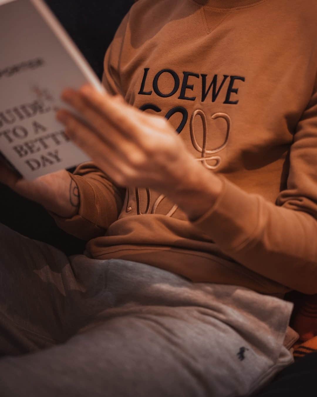 MR PORTERのインスタグラム：「Less screen time, more page time 📚 #MRPORTERatHome  Shop the story: The Mr Porter Paperback - The MR PORTER Guide to a Better Day Paperback Book, LOEWE - Slim-Fit Logo-Embroidered Loopback Cotton-Jersey Sweatshirt, POLO RALPH LAUREN - Slim-Fit Logo-Embroidered Fleece-Back Cotton-Blend Jersey Sweapants」