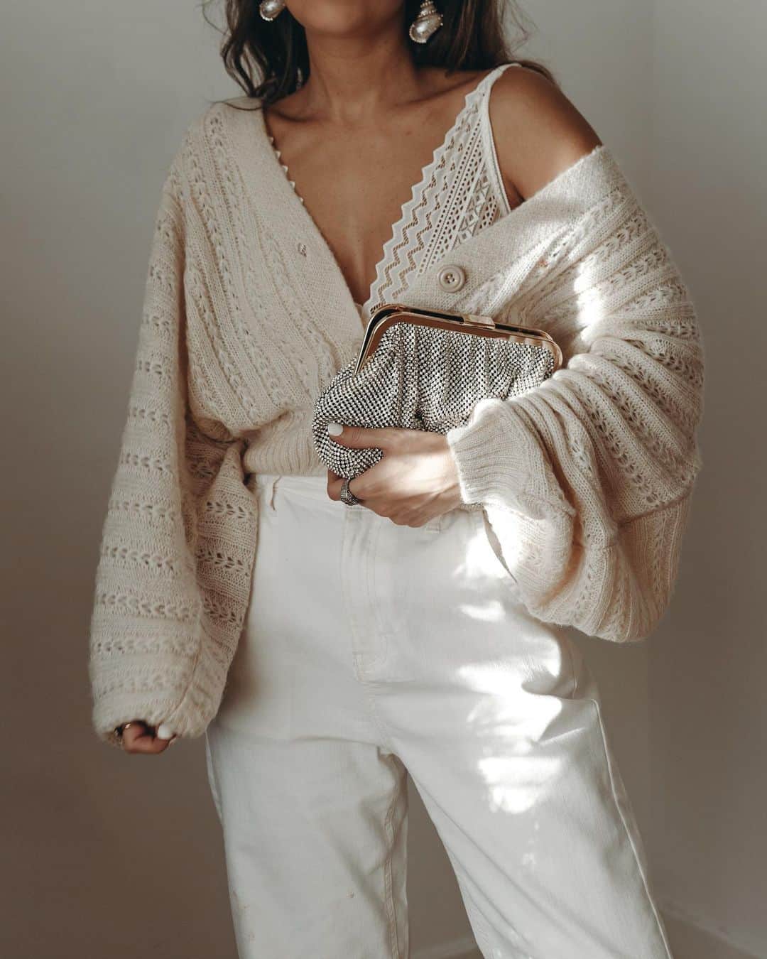Collage Vintageのインスタグラム：「Lace bra and cozy cardigan paired with a party clutch to stay at home this Christmas 🎄Link in bio for more holidays looks 😘」