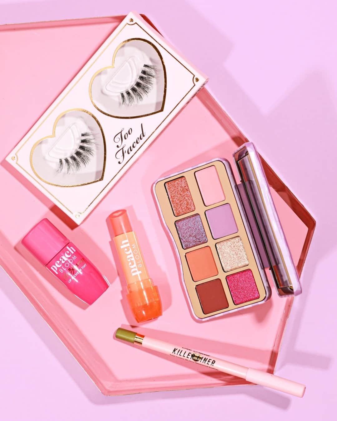 Too Facedのインスタグラム：「Ready to make everyone jelly? 😉 Play up your glam with our sexy, cool shades inspired by fresh-picked berries in our NEW That’s My Jam Eye Shadow Palette. Top it off with our Killer Liner, Peach Bloom Cheek Tint & Lip Balm, and our Better Than Sex False Lashes! #toofaced」