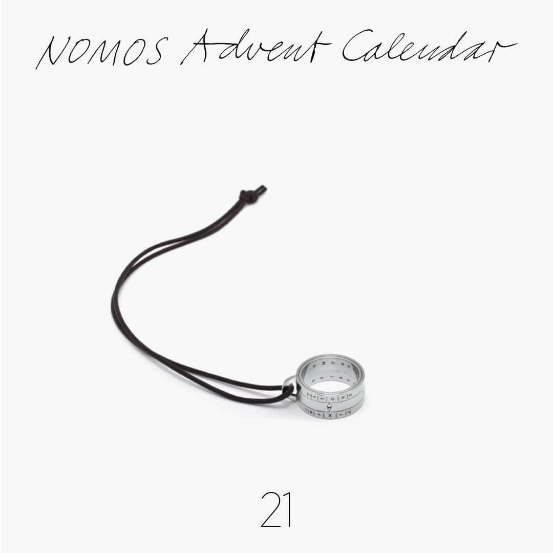 のインスタグラム：「It won’t fit on your wrist, but this wonderful NOMOS timepiece will still look great around your neck or on your finger. What could it be? Open door 21 to find out.  #nomos #glashütte #adventcalendar」