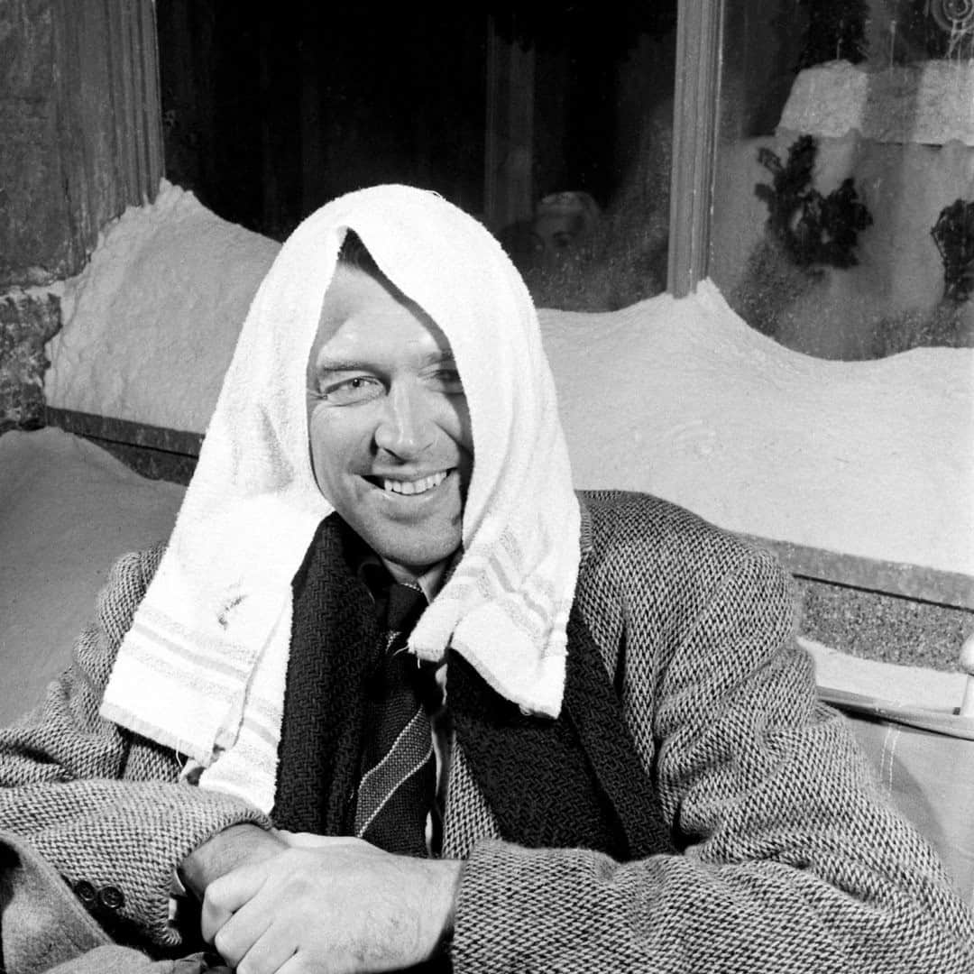 lifeのインスタグラム：「The Christmas classic 'It's a Wonderful Life' was filmed in 90-degree heat during the summer of 1946. Here's its star Jimmy Stewart cooling down on the vast California set. For more secrets from the movie's production—including the suspicious ingredient in the film's snow!—tap the link in bio. (📷Martha Holmes/LIFE Picture Collection)  #christmasmovies #jimmystewart #filmhistory #frankcapra #itsawonderfullife」