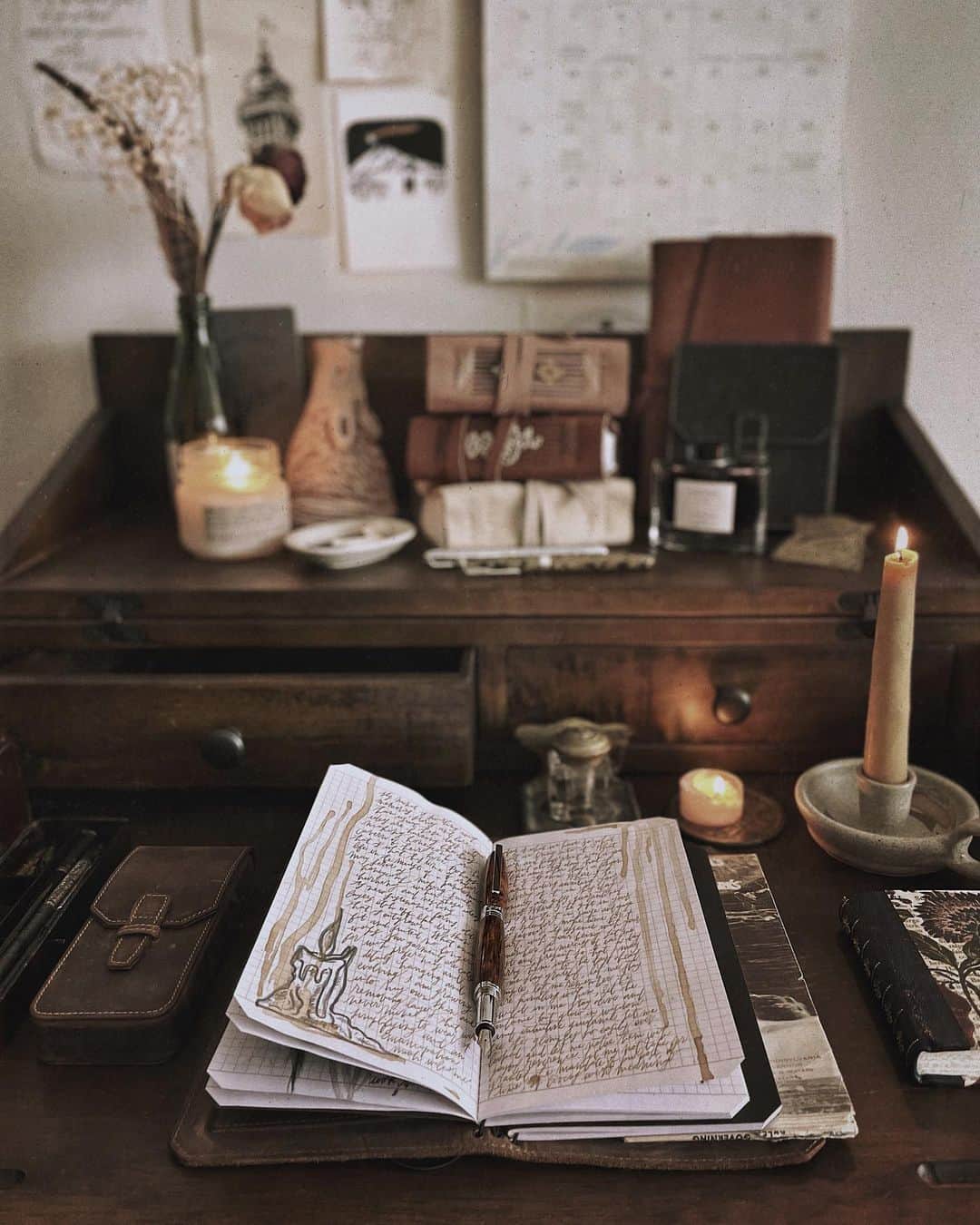 Catharine Mi-Sookさんのインスタグラム写真 - (Catharine Mi-SookInstagram)「More light etching into our days with the arrival of yesterday’s solstice. A theme I’ll walk with into the dawn of a new epoch, a theme I’ll embrace full hearted today. So many juggles and layers and loads weighted on countless shoulders and hands. I hope that in between the crevice of moments there would be the warmth of sunshine for sweet sustenance of the soul. And I hope for brighter chapters ahead with many blooms and sights to behold along the terrain for all. . . . . . Boot Brown Leather Vagabond Notebook & Three Penvelope Case @franklinchristoph. Baoshi Soyouz Fountain Pen in Amber @recifeparis. Ceramic #mypitchpine Candle Holder & Wolf Incense Burner @pitchpinepottery. Leather Journals w/ Handwoven spines @loombound. . . . . . #onmydesk #vagabondnotebook #franklinchristoph #journaling #recifeparis #recife #fountainpen #fountainpens #writinginstruments #travelersnotebook #darkacademia #darkacademiaaesthetic #deskgoals #booksandcandles #stillswithstories #hyggestyle #capturequiet #cozycorner #darkandlovely #darkandmoody #myquietbeauty #smallmomentsofcalm #documentyourdays #loveforanalogue」12月23日 0時13分 - catharinemisook