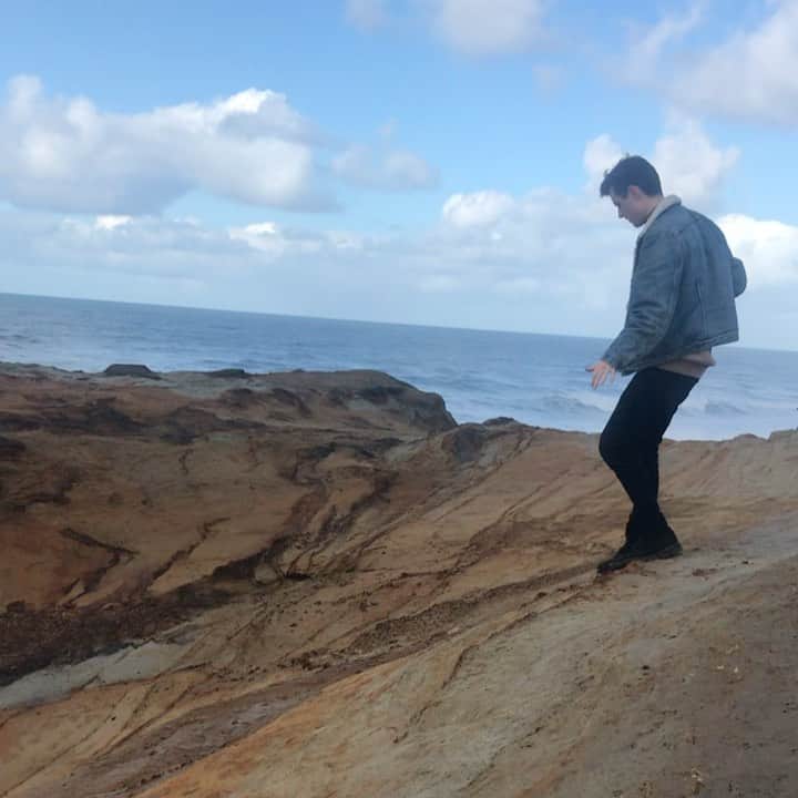 アリー・エックスのインスタグラム：「Brendon Burton was the photographer who brought my vision of Cape God to life. He is really cool guys. Let me tell you a little bit about him. He’s been traveling around North America since he was a teenager by himself, shooting ghost towns and derelict buildings.. anything abandoned.  And though he is used to doing literally everything himself, he’s also an incredible collaborator. For Cape God, we spent months going deep into concept, talking about color, story and how fashion could play a role. You should know that Brendon’s painterly work on Cape God was accomplished with natural light and occasionally a reflector. That’s it. He has an incredible eye, a vast knowledge of art and a curiosity about everything. Going through this BTS made me smile so hard. Thank you @kieleykimmelstudio , @timothyaylward, @abigerl, @yvonnetheartist , @lijhajade , @chacha.casaubon, @sharkandpalm, @moojproductions from the bottom of my heart. This creative process gave me memories to keep me warm in my darkest days ❤️❤️⁣ Brendon just put out his first photography book ‘American Poetry’ and like the rest of his work, it truly floors me. Head over to his IG and you’ll see.⁣..  ⁣  PS he doesn’t really have a mustache as per image 8, it was a ‘disguise’ @abigerl gave him so the National park ranger wouldn’t recognize him!」