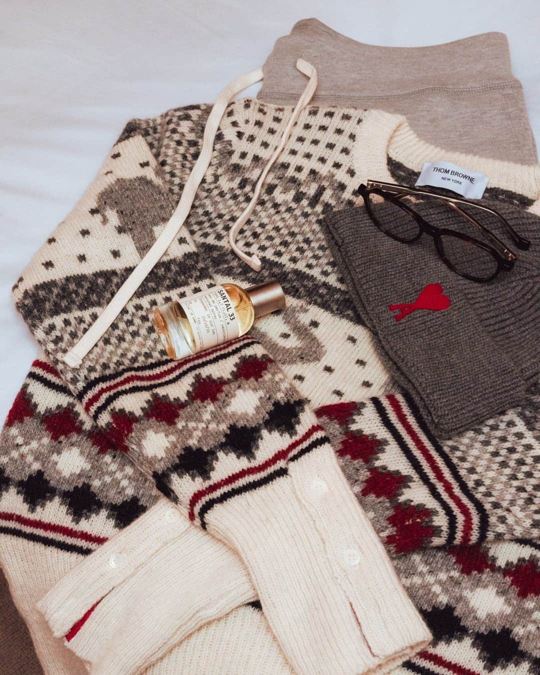 のインスタグラム：「Our festive uniform for the forseeable – and not a pair of novelty antlers in sight ❄️ #MRPORTERLittleLuxuries  THOM BROWNE - Fair Isle Wool and Mohair-Blend Sweater Le Labo - Santal 33 Eau de Parfum, 50ml」