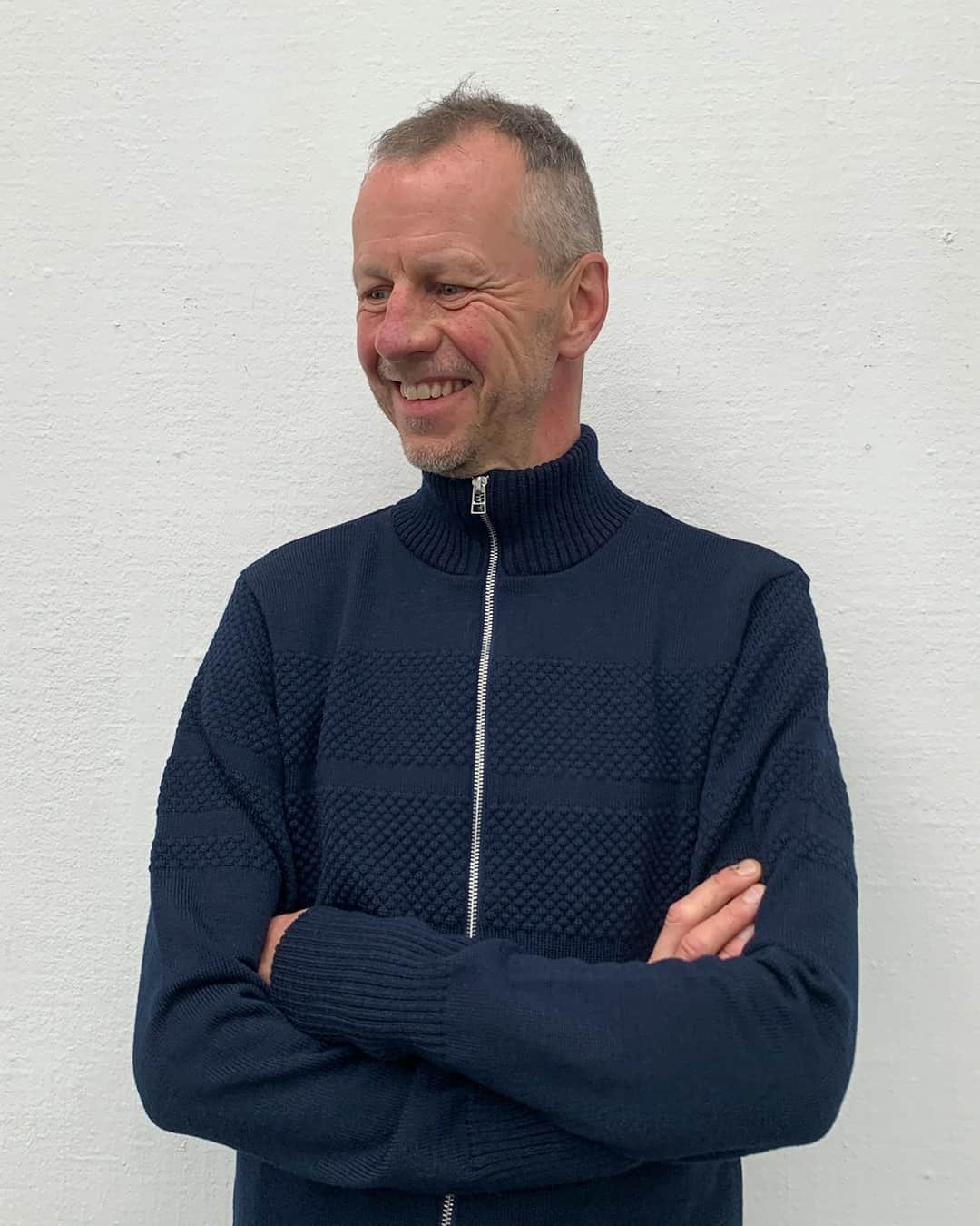 マッツノーガードのインスタグラム：「Mads founded Mads Nørgaard - Copenhagen in 1986 - starting as a menswear brand with a shop next to his father’s on Strøget, and since then evolving to a clothing brand dressing all gender and ages. ⁠ Mads loves culture and history and has always found inspiration across the artistic spectrum inviting art, music and literature inside his fashion house. ⁠ ⁠ For our final 'Favorite Journal' with Mads wearing his all time favorite sweater - the 'Klemens' knit.⁠ ⁠」