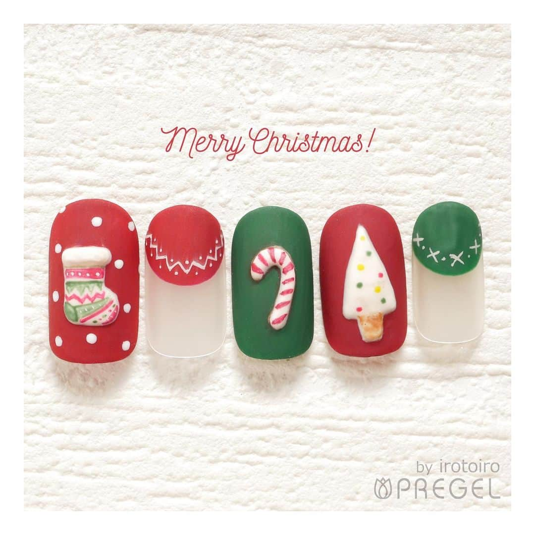 PREGELさんのインスタグラム写真 - (PREGELInstagram)「🎄⛄Merry Christmas🎅🎁﻿ @irotoiro.nail さんの#デザインネイル をご紹介！﻿ ﻿ 【使用カラー】﻿ ①﻿ C1001 ゆり﻿ C1003 べにこ﻿ C1005 たんぽぽ﻿ C1007 ひいらぎ﻿ C1023 ゆずは﻿ 3Dパウダー﻿ ﻿ 商品のご購入はwebショップ&店舗へ✨﻿ ▽webショップ﻿ プリモール﻿ @nail_premall﻿ ジョイアート﻿ @joyartofficial﻿ プリクシー﻿ @prexyofficial﻿ ﻿ ▽キャンディポケット店舗﻿ 心斎橋店﻿ @candypocket.shinsaibashi ﻿ 梅田店﻿ @candypocket_umeda﻿ 神戸三宮店﻿ @candypocket_kobe﻿ 五反田店﻿ @candypocketgotanda﻿ 園田店﻿ @candypocket.sonoda﻿ 町田店﻿ @candypocket_machida﻿ 柏店﻿ @candypocket_kashiwa﻿ ﻿ #プリアンファ #プリジェル #プリジェルミューズ #きまぐれキャット #ベティジェル﻿ #ジェルネイル #ネイル #トレンドネイル #インスタネイル #デザインネイル #モテネイル #大人可愛いネイル #マットネイル #手描きネイル #北欧ネイル #ショートネイル #くすみネイル﻿ #クリスマスネイル #xmasnail」12月24日 10時53分 - pregelofficial