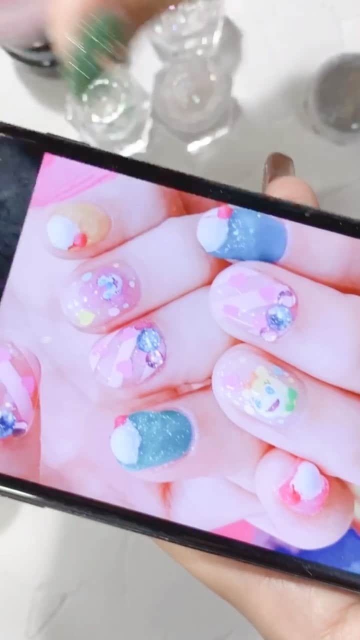 なかやまちえこのインスタグラム：「クリームソーダネイルを作ります。⠀ ⠀ I make Cream soda nails 🍹⠀ ⠀ （インスタライブ私用商材は最後の画像をご覧ください😌🙏）⠀ PREGEL・Betty gel・きまぐれキャット・PREANFA・PREXY商品は、ネイリストの方は↓ ⠀ プリモール @nail_premall ⠀ http://gelnailshop.com/ ⠀ ⠀ キャンディポケット @candypocket_official ⠀ http://www.beautysupport.jp/sm/script_main/shoptop.php ⠀ ⠀ セルフの方は↓ ⠀ ジョイアート @joyartofficial ⠀ http://joyart.biz/ ⠀ ⠀ にて購入頂けます☺️⠀⠀  ⠀ #nail #nails #nailart #ネイル #美甲 #ネイルアート  #japanesenailart #manucure #japanesenails #manicurist #gelnails #أظافر #네일아트 #미용 #vẽmóng #ngườiđẹp  #เพ้นท์เล็บ #искусствоногтя #artedeuñas #เพ้นท์เล็บเจล #ジェルネイルデザイン #ネイルデザイン #senikuku #nagelkunst #クリームソーダ #クリームソーダネイル #creamsoda @pregelofficial @kimagure_cat_whim @bettygel_official @prexyofficial #ゆめかわ #ゆめかわネイル #kawaii」