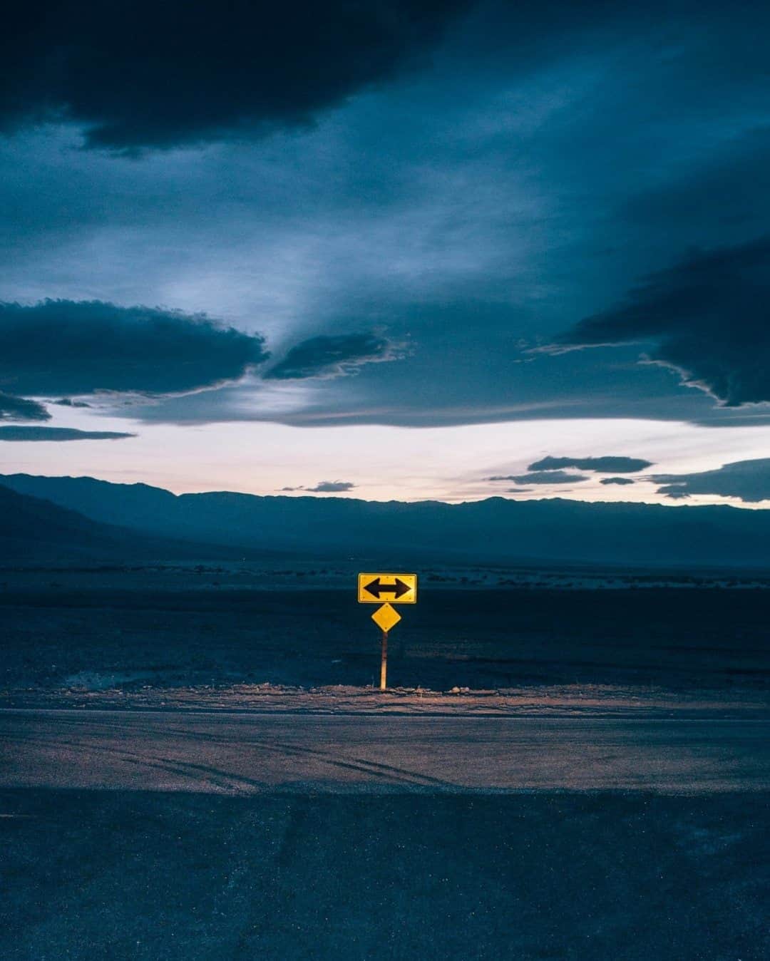 National Geographic Travelさんのインスタグラム写真 - (National Geographic TravelInstagram)「Photo by @joshuacogan / Coming out of a meandering highway leading out of Death Valley in California, you are presented with a few options. Despite my choices, likely because of the stunning evening light, I found myself stuck and contemplating the beauty of indecision itself. For more road trips and wanderings throughout the world, follow me @joshuacogan.」12月25日 16時39分 - natgeotravel