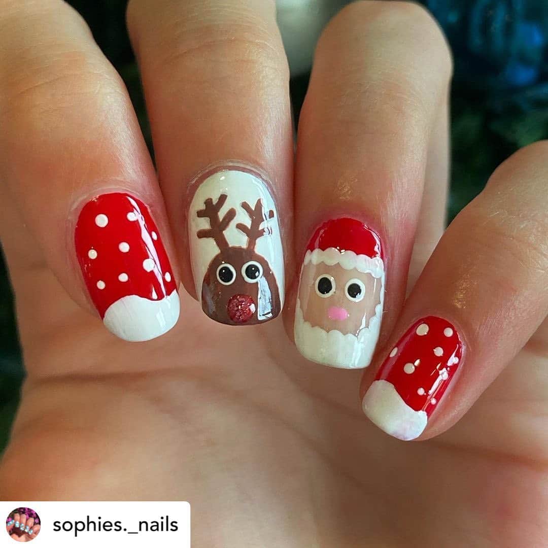 Nail Designsさんのインスタグラム写真 - (Nail DesignsInstagram)「Credit • @sophies._nails Merry Christmas! 🎅🏼 Hope everyone’s having a wonderful day today! Different background for this one as my light made it look too dark, so in front of the tree it is! 🎄 Here’s Santa and Rudolph made with @opinewzealand ‘Big Apple Red’ and ‘Alpine Snow’, the rest is acrylic paint 😜 Have a great day :) • #nail #nails #nailart #nailartist #nailspiration #nailsoftheday #nails2inspire #nailstagram #nailpromote #nailpolish #nailpolishaddict #kawaii #polish #nailswag #nailedit #nailsdesigns #nailsonfleek #nailsofinstagram #manicure #beauty #fashion #mani #cute #nailspafeature #nailsofinsta #christmasnails #xmasnails #christmas #festivenails」12月25日 22時51分 - nailartfeature