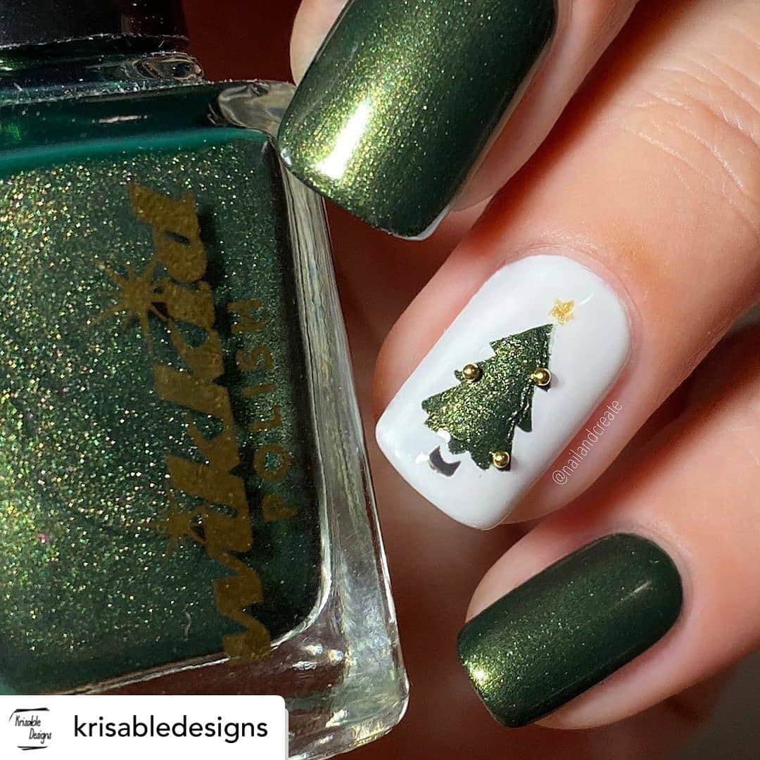 Nail Designsさんのインスタグラム写真 - (Nail DesignsInstagram)「Credit • @krisabledesigns #Repost @nailandcreate • • • • • • Christmas tree 🎄 for #glamnailschallengedec I got these adorable nail vinyls from @krisabledesigns and had to try it! And not only is it super cute, it ess so easy to use even with a peely base . Wikkid Polish {Forest}, {Butterscotch} and {Ombre Ash #5} Krisable Designs christmas tree vinyls Depend No. 031 . #glamnailschallenge #christmastree #wikkidpolish #wikkidwednesday #wikkidwhore #nailart #christmasnails #nailista #nailsofinstagram #nailstagram #nailinspo #easynailart #nailitdaily #naillove #nailaddict #krisabledesigns #instanails #naceasynailart #nacwikkid #nailpromote #indieswatch #nailspafeature」12月25日 23時54分 - nailartfeature