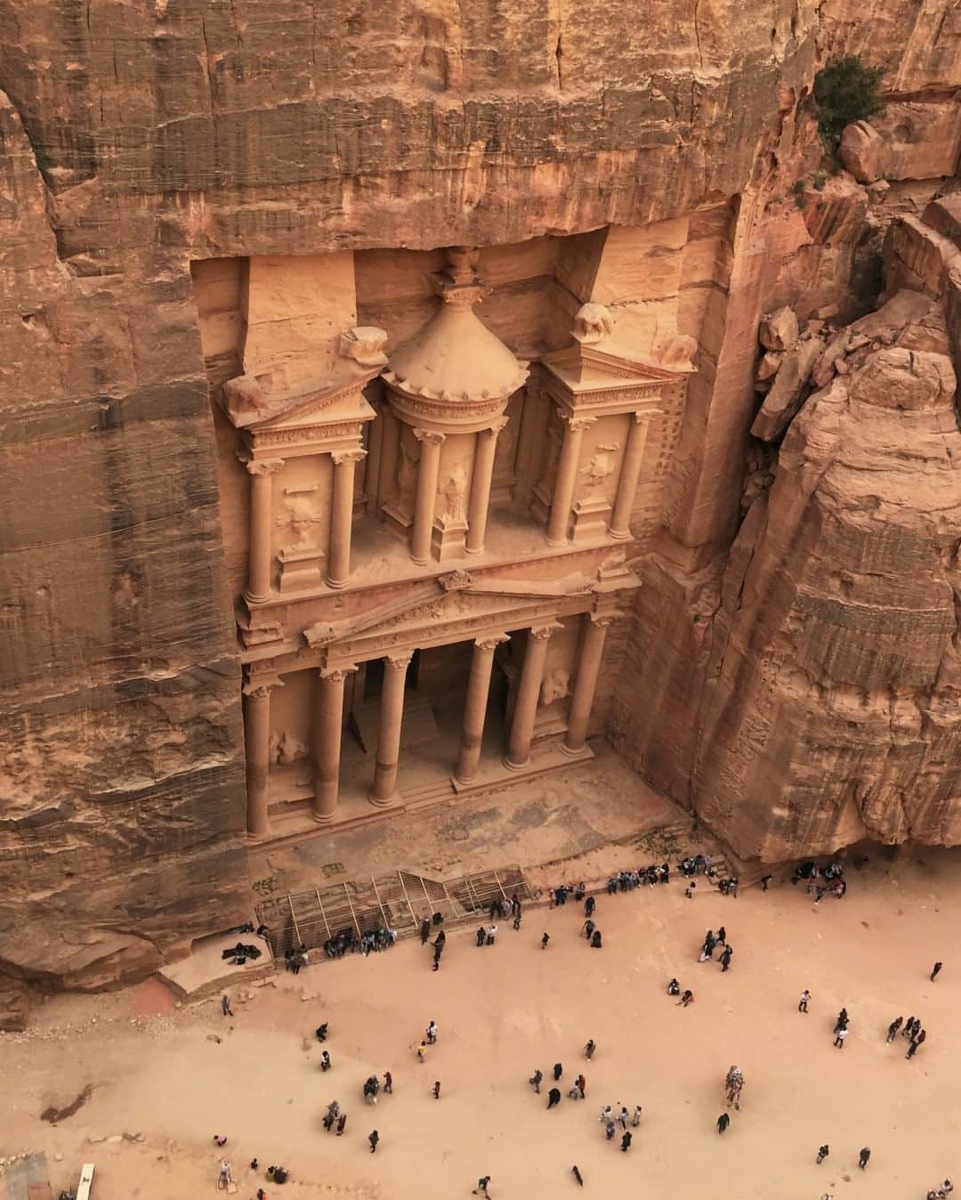 National Geographic Travelさんのインスタグラム写真 - (National Geographic TravelInstagram)「Photo by Muhammed Muheisen @mmuheisen / How small we appear against monuments of history. In the ancient city of Petra in Jordan, Al Khazneh (Arabic for "the treasury") is one of many facades carved into the mountains. For more photos and videos from different parts of the world, follow me @mmuheisen and @mmuheisenpublic. #muhammedmuheisen #Jordan #الاردن」12月27日 0時37分 - natgeotravel