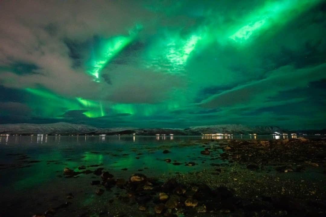 ナショナルジオグラフィックさんのインスタグラム写真 - (ナショナルジオグラフィックInstagram)「Photo by Pete McBride @pedromcbride / The quiet dance of the Arctic lights was a spellbinding finish to a cold day on the icy ocean. The northern lights, also known as aurora borealis, emerge in the sky when the sun's outermost plasma drives the solar wind toward Earth. The particles collide with nitrogen and oxygen atoms in the atmosphere, creating ions that give off the colors that light up the sky. This natural phenomenon has fascinated people for centuries, and it is even thought to be depicted in a cave painting dating back to 30,000 B.C.  For more quiet places, follow @pedromcbride. #nature #northernlights #Norway #humbled #PeteMcBride」12月27日 12時34分 - natgeo