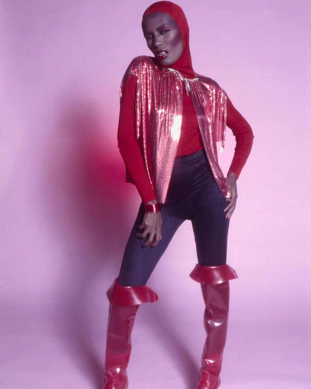 パット・マグラスさんのインスタグラム写真 - (パット・マグラスInstagram)「INTERSTELLAR ICON ⚡⚡⚡ #GraceJones poses in knee-high red boots and a shimmering red top, photo by Angelo Deligio, 1987 ⚡⚡⚡ #patmcgrathlabs #inspiration」12月27日 21時56分 - patmcgrathreal