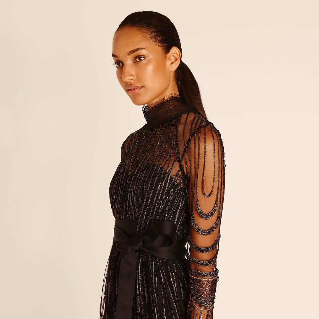 アマンダ ウェイクリーのインスタグラム：「Textural indulgence... Bronze fringed embroidery trimmed with delicate lace   #embroidery #cocktaildress #metallicdress #lace #aw20」