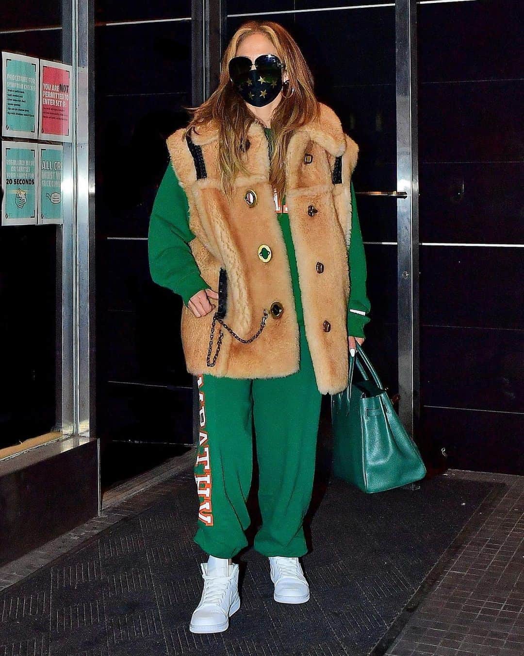 Just Jaredさんのインスタグラム写真 - (Just JaredInstagram)「@jlo wore a green sweatsuit and a fur vest while leaving the rehearsal studio on Monday night in New York City. She’s preparing to perform on New Year’s Eve in Times Square! #JenniferLopez Photo: Backgrid」12月29日 9時57分 - justjared