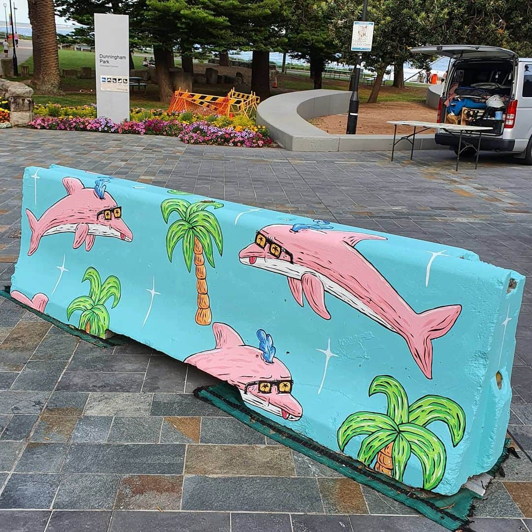 MULGAさんのインスタグラム写真 - (MULGAInstagram)「Another one of four concrete traffic barricades I had the pleasure of painting at North Cronulla 🐬🌴🌊😎. ⁣ ⁣ This one is my personal favourite and you can even see a larger version of the pink Dolphin Pete a few metres up the road in Cronulla Mall.⁣ ⁣ An Ode to Dolphin Pete⁣ ⁣ Dolphins are nice, dolphins are neat⁣ This guy is even called Dolphin Pete⁣ ⁣ He chases the summer all year round Surfing summer waves with a leap and a bound⁣ ⁣ He competes in all the surf comps and always wins⁣ Probably because he really knows how to wiggle his fins⁣ ⁣ He is also a world champion hula hooper And has a brother called Maxwell and another called Cooper⁣ ⁣ The End ⁣ ⁣ #mulgatheartist #cronulla #cronullabeach #dolphin #dolphinart #sydneystreetart #australianart #palmtree #cronullaart #pinkdolphin #surfart」12月30日 5時21分 - mulgatheartist