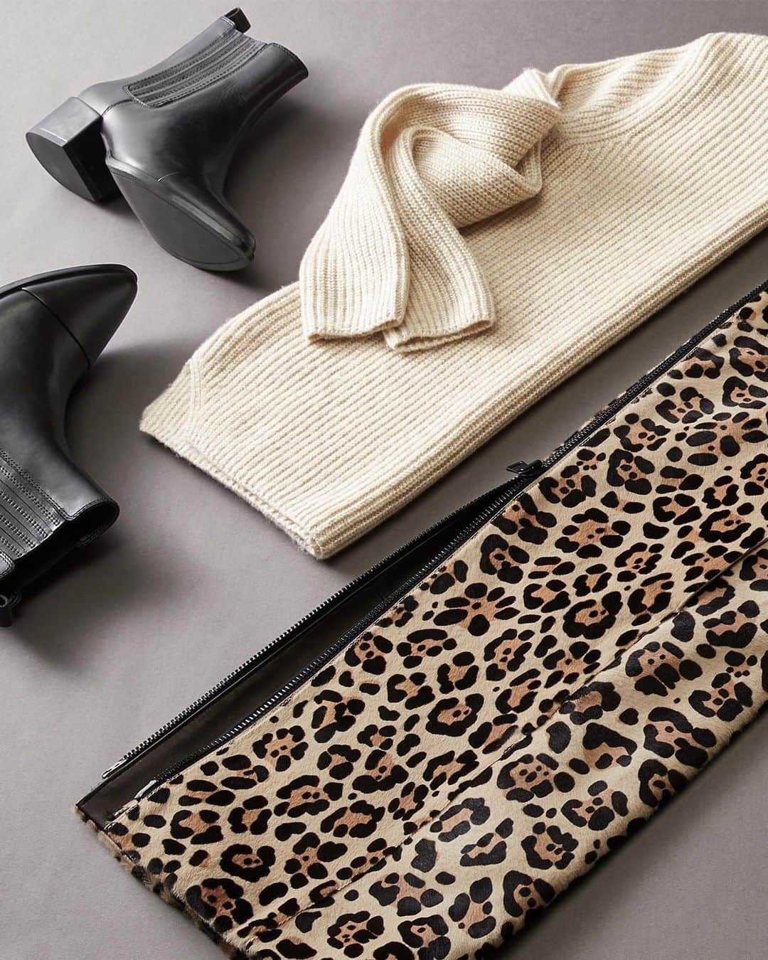 Banana Republic のインスタグラム：「Here's the lay down: elevate an easy sweater with our Vegan Leather pant paired with our Heritage Leather Haircalf Coat. You'll be looking as cool as a cat.」