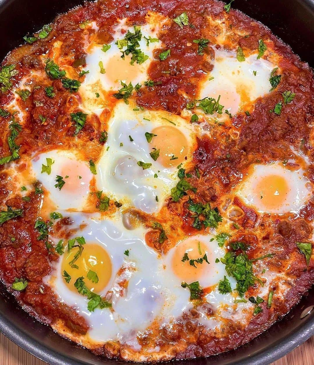 Flavorgod Seasoningsさんのインスタグラム写真 - (Flavorgod SeasoningsInstagram)「Beefed up Shakshuka by @_dashofhappiness_⁠ -⁠ Seasoned with Flavor God Everything Spicy Seasoning⁠ -⁠ Add delicious flavors to your meals!⬇️⁠ Click link in the bio -> @flavorgod  www.flavorgod.com⁠ -⁠ "🌟 we were craving our usual Moroccan meatball Tagine but i didn’t feel like making the meatballs so it turned to just ground beef, pepper, delicious spices, & herbs in a savory tomato sauce (basically a traditional Shakshuka with added beef) - It was SUCH a delicious easy quick meal: one pan & quick cleanup. Served it with some low carb toasted bread and that was it!"⁠ ⁠ Make it for breakfast, lunch or dinner!😍⁠ .⁠ .⁠ INGREDIENTS (serves 2-4)⁠ * 1 pound ground beef⁠ * 1 yellow onion, sliced thin⁠ * 1/2 red bell pepper & 1/2 green pepper (diced)⁠ * 5 garlic cloves, pressed or finely minced⁠ * 1 can peeled tomatoes⁠ * 1 1/2 tbs @flavorgod spicy everything seasoning (this seasoning has cumin, paprika,⁠ onion, garlic, cayenne, chili, black pepper, salt, basil & parsley - it’s the perfect all in one seasoning for this!)⁠ * 6 eggs⁠ * cilantro & parsley chopped to top⁠ * 1 tbs olive oil⁠ 🤍⁠ METHOD⁠ * heat oil and add onions to cook until translucent. Add in ground beef and crumble them up. Season with pinch of salt and pepper.⁠ * Add in peppers to cook. Once cooked slightly, add in your canned tomatoes, garlic, and your spice mix. Taste test and season with more salt & pepper if needed. Stir & let simmer about 10mins over medium heat⁠ * Make 6 small wells in the mixture and crack your eggs. Cover to let the eggs cook. Leave lid slightly open to keep the eggs sunny side up if you wish and from overcooking⁠ * Once eggs are cooked season with a pinch of black pepper, top with cilantro & parsley!⁠ -⁠ Flavor God Seasonings are:⁠ ✅ZERO CALORIES PER SERVING⁠ ✅MADE FRESH⁠ ✅MADE LOCALLY IN US⁠ ✅FREE GIFTS AT CHECKOUT⁠ ✅GLUTEN FREE⁠ ✅#PALEO & #KETO FRIENDLY⁠ -⁠ #food #foodie #flavorgod #seasonings #glutenfree #mealprep #seasonings #breakfast #lunch #dinner #yummy #delicious #foodporn」1月13日 22時01分 - flavorgod