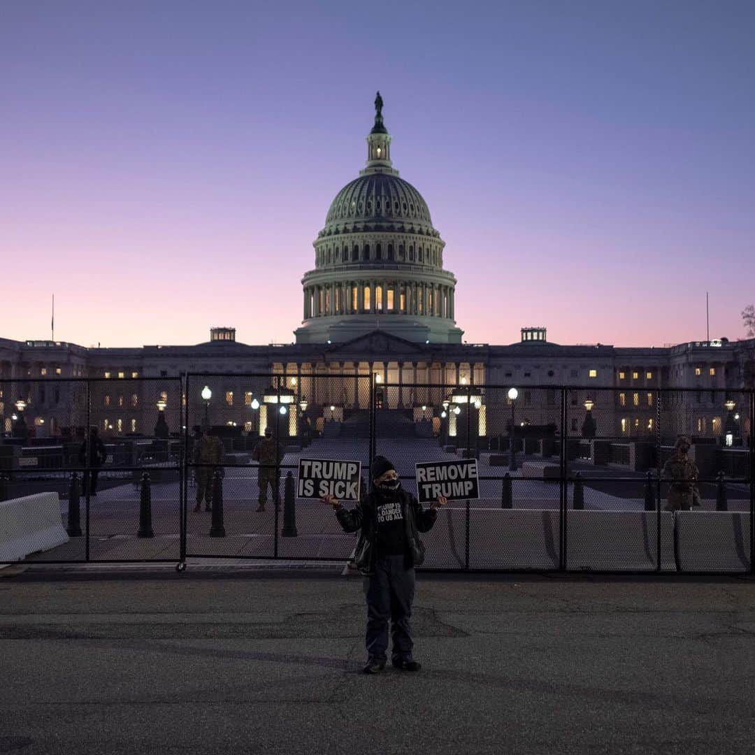 TIME Magazineさんのインスタグラム写真 - (TIME MagazineInstagram)「If you want to do big, durable things in Washington, you seldom can do it along party lines. Which brings us to today, when House Speaker Nancy Pelosi is going to set in motion President Trump’s second impeachment, writes Philip Elliott. A little more than a year ago, the House voted in favor of his first impeachment in a pretty straight, party-line vote. No Republicans in the House voted for it, and only Sen. Mitt Romney was willing to cross the President. Romney cast his vote to convict only on one of the two charges. Now, you’re starting to see the floodgates break. Most significantly, Rep. Liz Cheney, a member of her party’s Leadership team, isn’t whipping votes away from Pelosi. She’s calling it a “vote of conscience,” meaning members can do what they think is best, and on Tuesday evening said she would be voting for impeachment. Read more at the link in bio. In these photographs: members of the National Guard rest in a hallway of the Capitol building on Jan. 13, and a Trump protestor stands by as members of the National Guard arrive at the Capitol in Washington, D.C., on Jan.12. Photographs by @sarahsilbiger—@bloomberg/@gettyimages and @gdemczuk for TIME」1月14日 2時31分 - time