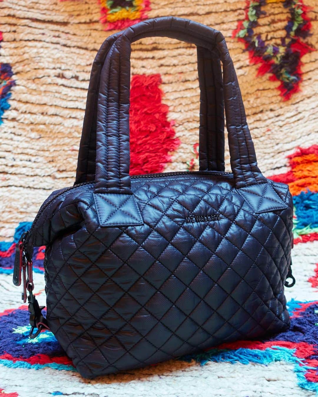 MZウォレスのインスタグラム：「New year, new Sutton! You asked, we listened, and our bestselling Sutton just got even better. Introducing the Sutton Deluxe, with two exterior pockets for extra organization and quick access to your essentials. Swipe to get a closer look and tap to shop.」