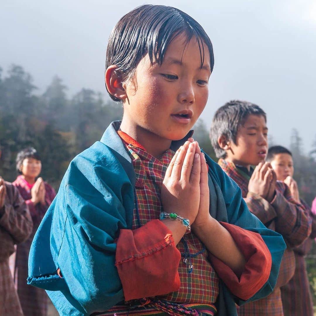 ナショナルジオグラフィックさんのインスタグラム写真 - (ナショナルジオグラフィックInstagram)「Photos by Pete McBride @pedromcbride / The lens has introduced me to a remarkable array of humans. I often wonder where they are today. These unpublished portraits are just a few of the gentle, friendly souls I met in the tiny country of Bhutan, when I trekked 230 miles (370 km) for @natgeo across its northern Himalaya border. We traveled along an ancient yak herders' route over eleven high-mountain passes (some above 5,000 meters/16,000 ft) on what is considered today one of the hardest treks in the world, due to its length, elevation, and weather. In 28 days of hiking, I saw not one wheel. #travel #bhutan #humanity #portraits #petemcbride」12月31日 0時54分 - natgeo