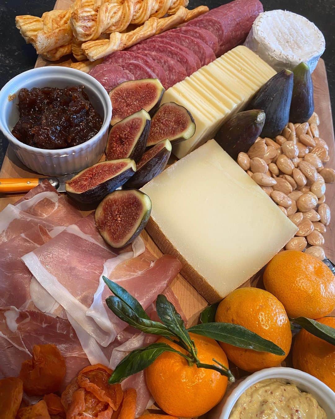 アイナ・ガーテンのインスタグラム：「My holiday Charcuterie Board takes #storeboughtisfine to a whole new level! Perfect for watching a football game or (dare I say it??) an easy dinner with  a green salad and a glass of wine. Have a happy - and celebratory! - New Year!  It’s been an awful year but it’s good to remember all the things and people we’re grateful for. “Recipe” link in profile.  #happynewyear2020」