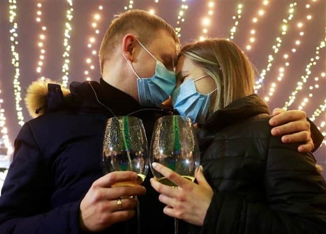 NBC Newsさんのインスタグラム写真 - (NBC NewsInstagram)「A couple embraces during a New Year's Day celebration in central Kyiv on January, 1, 2021.⁠ ⁠ 📷 Valentyn Ogirenko / @Reuters」1月1日 10時14分 - nbcnews
