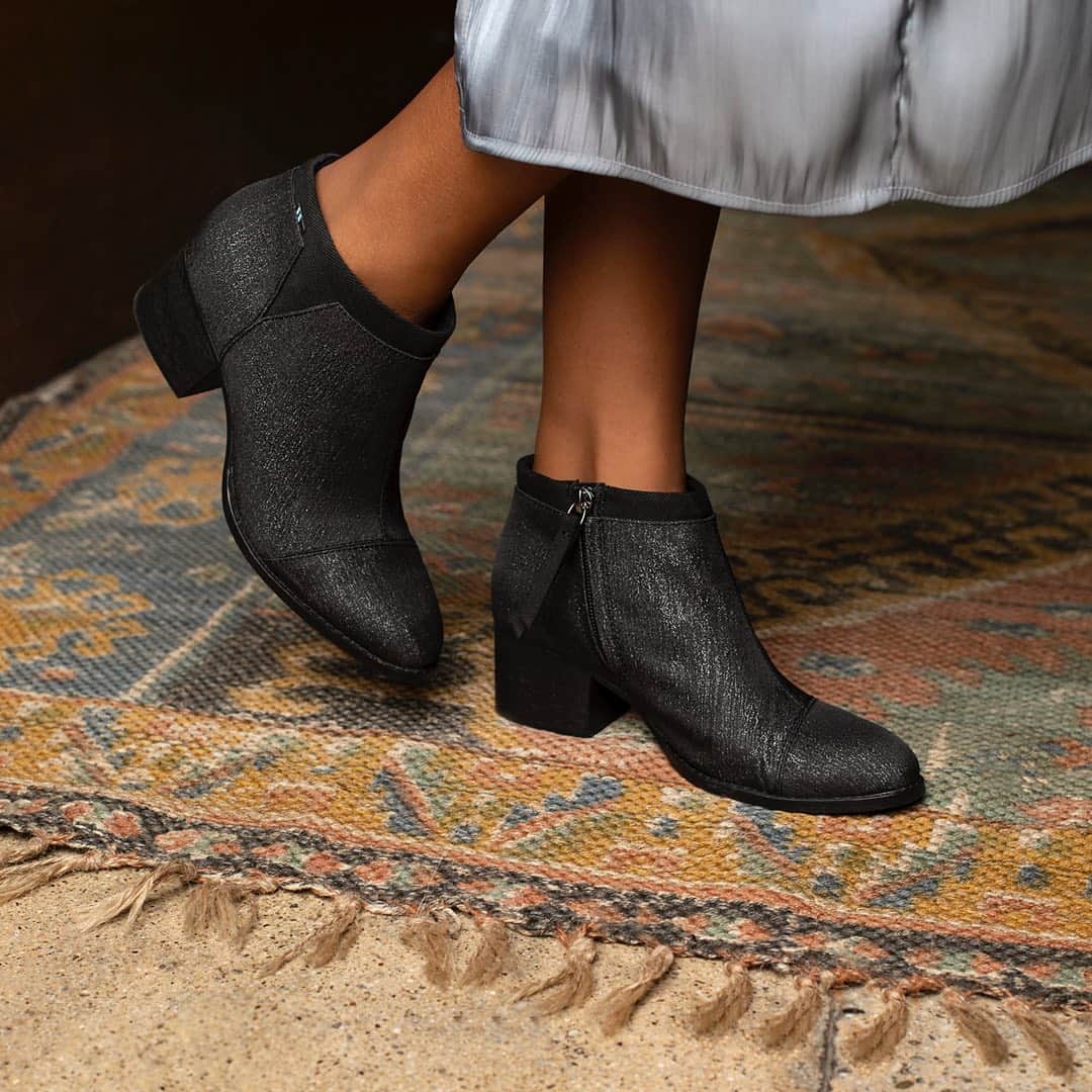 トムズシューズのインスタグラム：「New year, new boots, same promise: support for the causes you care most about.  📷 The Loren Bootie, featuring a subtle metallic sheen.」