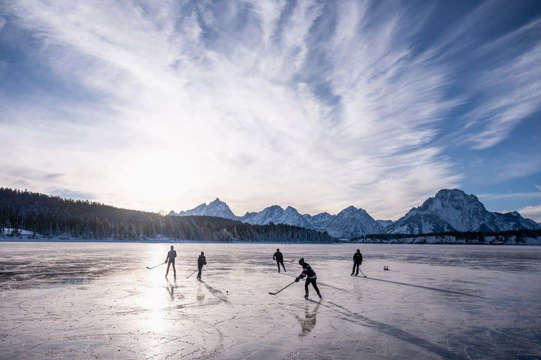 National Geographic Travelさんのインスタグラム写真 - (National Geographic TravelInstagram)「Photos and videos by @taylorglenn / In early December the conditions lined up just right, creating a very rare opportunity to glide across a frozen Jackson Lake in Grand Teton National Park. Ice skating is certainly common in Wyoming during the winter months but not so much here. One old-timer we met on the ice said he figured it was at least 20 years ago that he remembered this happening. It was a magical experience sliding around with friends and one I will never forget. Swipe through the gallery for more from this incredible evening on the ice. Follow @taylorglenn for more from #Wyoming and beyond. #grandtetonnationalpark #iceskating #iceskater」1月1日 2時49分 - natgeotravel