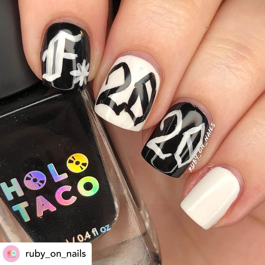 Nail Designsさんのインスタグラム写真 - (Nail DesignsInstagram)「Credit • @ruby_on_nails I wanna be black and white about expressing my feelings on this past year. F*CK 2020.   We can agree that this year has been hard, very hard. I seriously hope that 2021 will be easier. Happy New Year folks 🥂  ————————————————— Products 💅 @holotaco smoothing Basecoat, One Coat Black, and Super Glossy Topcoat @dndgel Snowflake  ———————————————— 10% off @ maniology: RUBYONNAILS 20% off @ Dimension Nails: rubyonnails20 10% off @ Loud Lacquer: ruby10 ———————————————————— Twitter: @ nails_ruby Instagram: @ ruby_on_nails Reddit: ruby_on_nails Youtube: ruby_on_nails ———————————————————— #nailaddict #nailart #nailitdaily #nailsofig #nailartjunkie #nails #nailstagram #nailsofinsta #nailsofinstagram #nailpolishaddict #nailpolishcommunity #indienails #naturalnails #nailitdaily #nailsoftheday #nailsonfleek #ignails #thenailgoals #allprettynails #nailporn #macro  #indiebrand #holonails #holographic #holographicnails #holographic #fuck2020 #newyearnails #2021 #holotaco #holotaconailart #simplynailogical」1月2日 22時19分 - nailartfeature