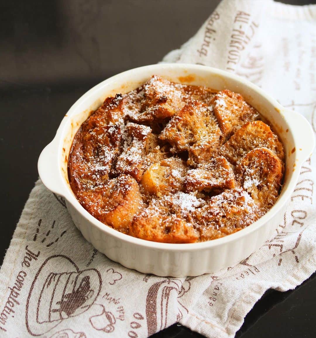 Li Tian の雑貨屋のインスタグラム：「{ #dairycreamkitchen } Sunday brunch talks of this humble bread and butter pudding. Made with leftover @paulbakerysg Flute 🥖, egg, milk tea powder, fresh milk and some arm power to wrestle with the aged baguette 💪🏼  • •  #singapore #breakfast #igersjp #yummy #love #sgfood #foodporn #igsg  #instafood #beautifulcuisines #sgbakes #bonappetit #cafe #bake #sgcakes #igsgfood #feedfeed #pastry #sgcafe #cake #homebaker #stayhomesg #homebake #weekend #sunday #holidays #brunch #musttry #bread」