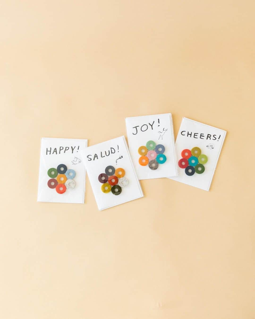 グラフ&ランツのインスタグラム：「Introducing: Wine-Ote’s! Our regular Wine-O felt markers were so popular we decided to take them up a notch. The card features removable and usable wine-o glass markers on the front with a blank space on the inside to express your well wishes, and an envelope to seal it. We’re also excited to announce that we worked with one of our favorite local Los Angeles artists, Claire Gallagher of @animal.theory, to make these greeting cards - swipe to see some of the artwork progression and how she brought elements of joy and cute creatures to life. Pair with a bottle of wine and you’re set for a housewarming, holiday party, - or mailbox - near you.」