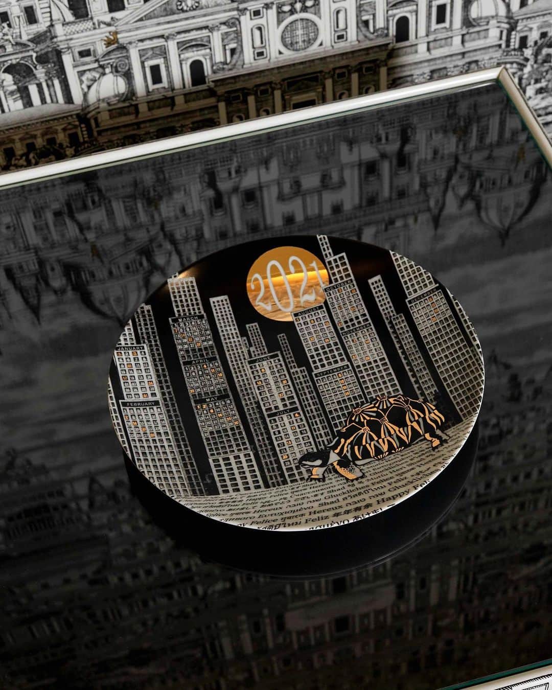 レクレルールのインスタグラム：「The Fornasetti 2021 Calendar plate embodies the idea of the rediscovery of time, and invites us to enjoy every moment with a new gaze and awareness. Like this turtle, join us in celebrating #slowlife as a guiding value for the New Year — A value that leads us to look at life in a more conscious way.  This 2021 Calendar Plate is available in a limited edition of 850 pieces. Please contact us for further information and to make this new beginning even more special 💫  #Leclaireur #conceptstore #fornasetti  #calendarplate #2021」
