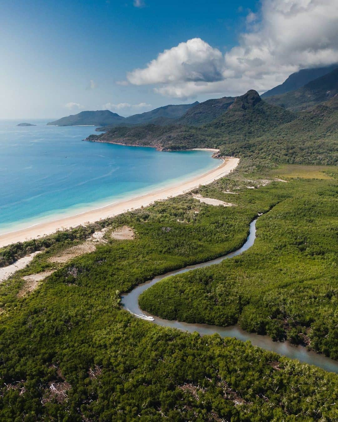 Australiaさんのインスタグラム写真 - (AustraliaInstagram)「Hey Siri, add #HinchinbrookIsland to our bucket list 🙌🏻 ⛰ This @tropicalnorthqueensland #Island is @schmidtdogg_’s favourite place in the world and it’s easy to see why. The Jurassic landform, off the coast of @queensland, is a wild playground of misty mountains, luscious rainforest, and white sandy beaches. An explorers paradise, the island’s 32-kilometre hike along the #ThorsborneTrail in #HinchinbrookIslandNationalPark is a must-do. It takes you to the top of #ZoeFalls where you can look out across the island and swim in the rock pools high above the tree-tops. #seeaustralia #thisisqueensland #exploreTNQ #holidayherethisyear」1月4日 19時00分 - australia