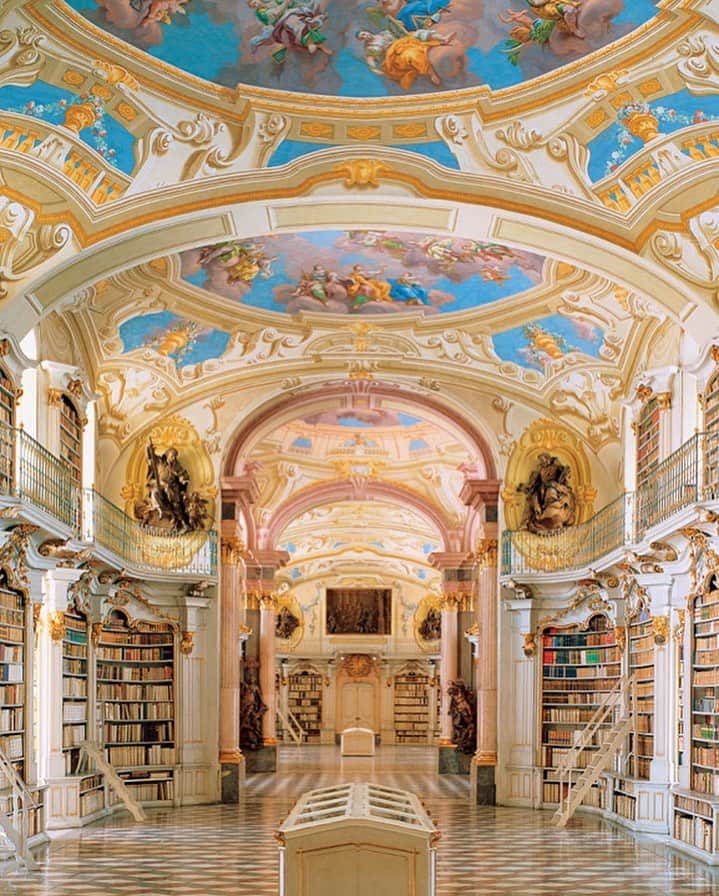 Lonely Planetのインスタグラム：「Books, art, history, oh my!  Would you be too distracted to get any reading done in here?   Deemed one of the most beautiful libraries in Europe is Stiftsbibliothek Admont in Austria. The building was completed in 1776, in Baroque style, and inside you'll find various artistic features, including statues and golden decorations.   Want to find out where to see the most beautiful libraries in Europe? Follow the link in our bio.」
