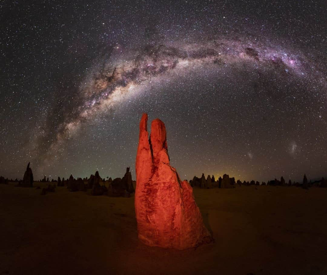 National Geographic Travelさんのインスタグラム写真 - (National Geographic TravelInstagram)「Photo by @babaktafreshi / Western Australia has some of the darkest places on the planet for stargazing. This is the Pinnacles Desert in Nambung National Park. These bizarre limestone formations are made from seashells and lime-rich sand. The Milky Way and the Magellanic Clouds appear in the sky. Explore more of the world at night photography with me @babaktafreshi. #twanight #australia #stargazing #darkskies」1月6日 8時35分 - natgeotravel